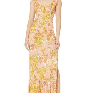 Free people dress from this summers collection. Still in packaging with tags!